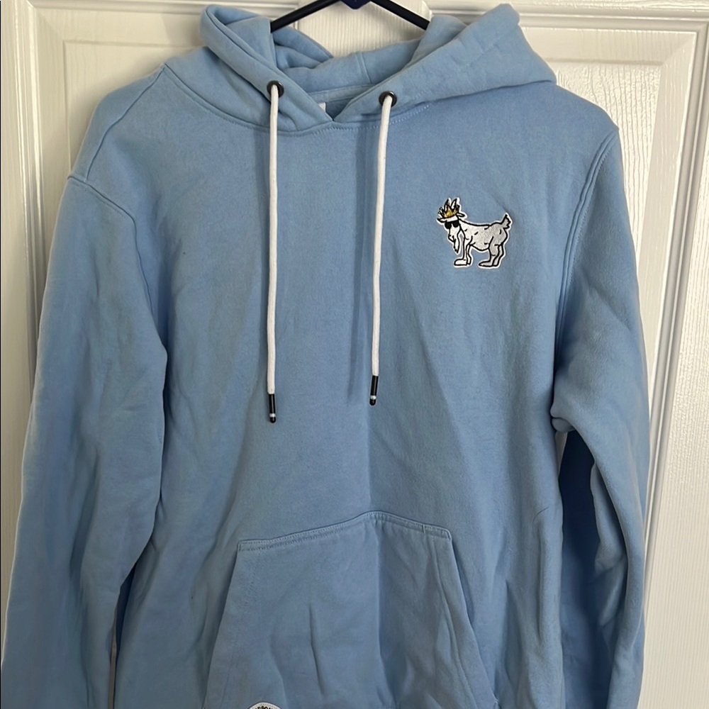 Blue and White Sweatshirt with Cartoon Character